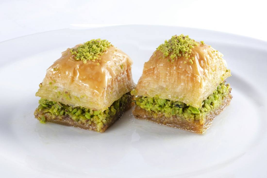 Two squares of pistachio baklava