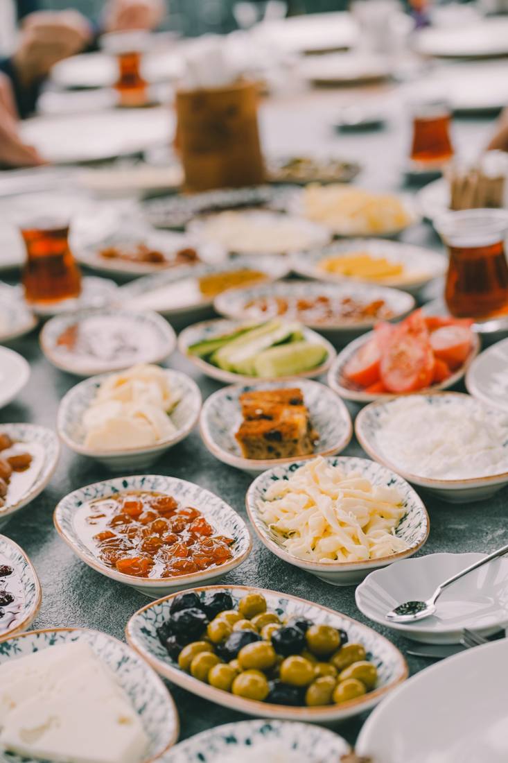 A table covered in small meze plates
